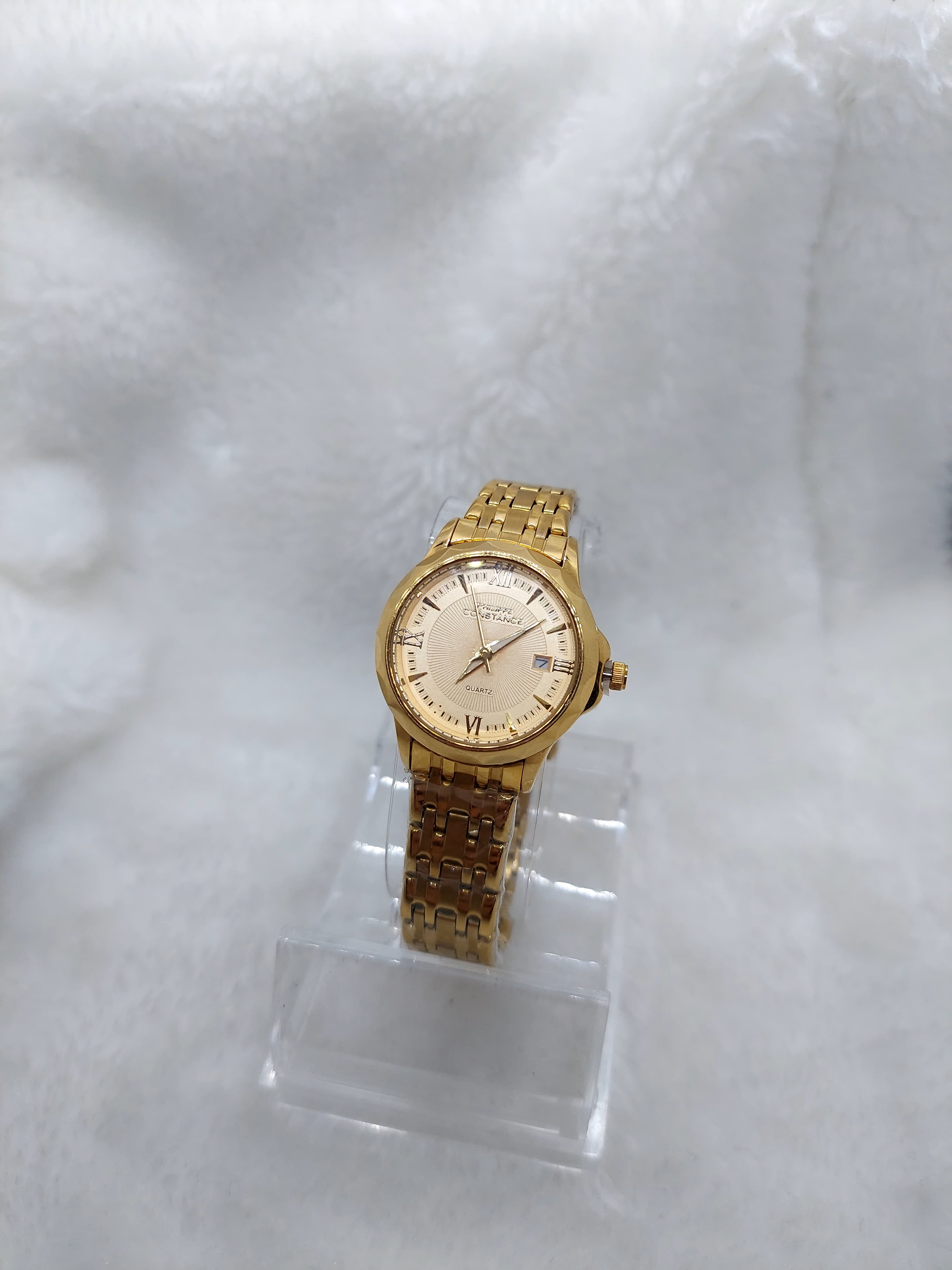 Montre ronde doré avec date - product image